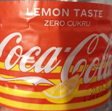 Zdjęcia - Coca-Cola lemon taste zero cukru