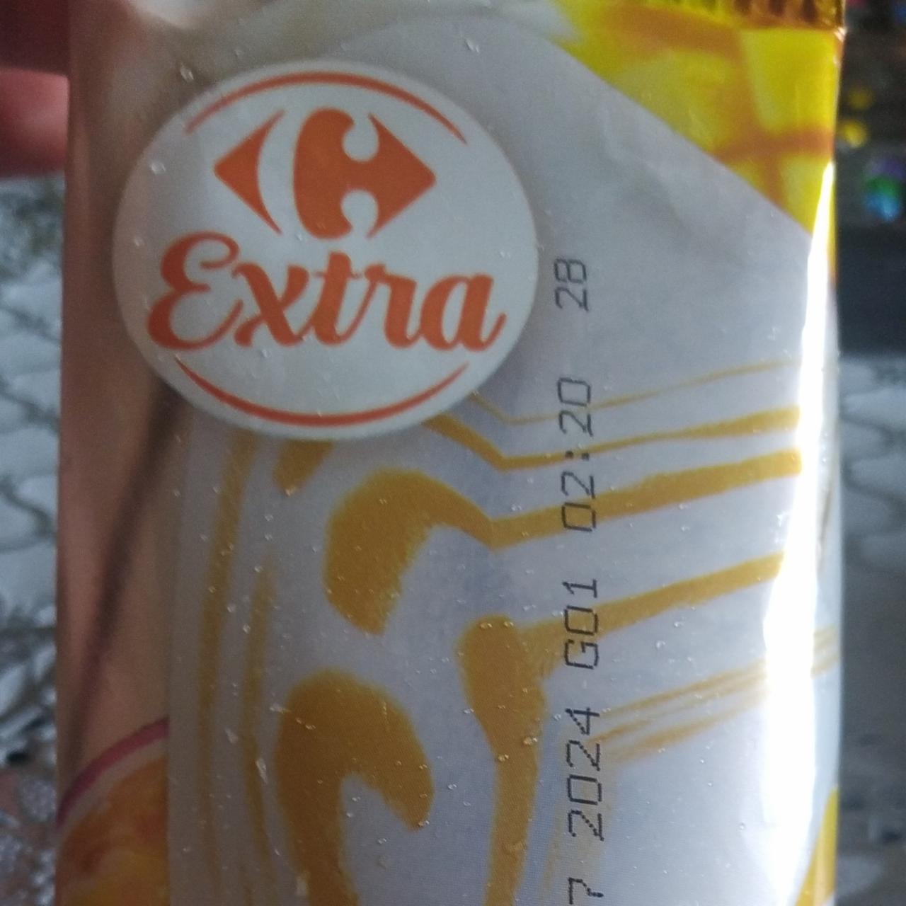 Zdjęcia - lody śmietankowe z sosem mango marakuja Carrefour