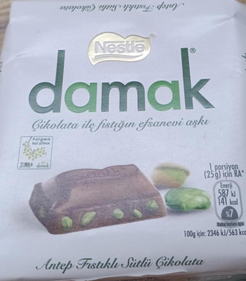 Zdjęcia - Damak czekolada mleczna z pistacjami Nestlé