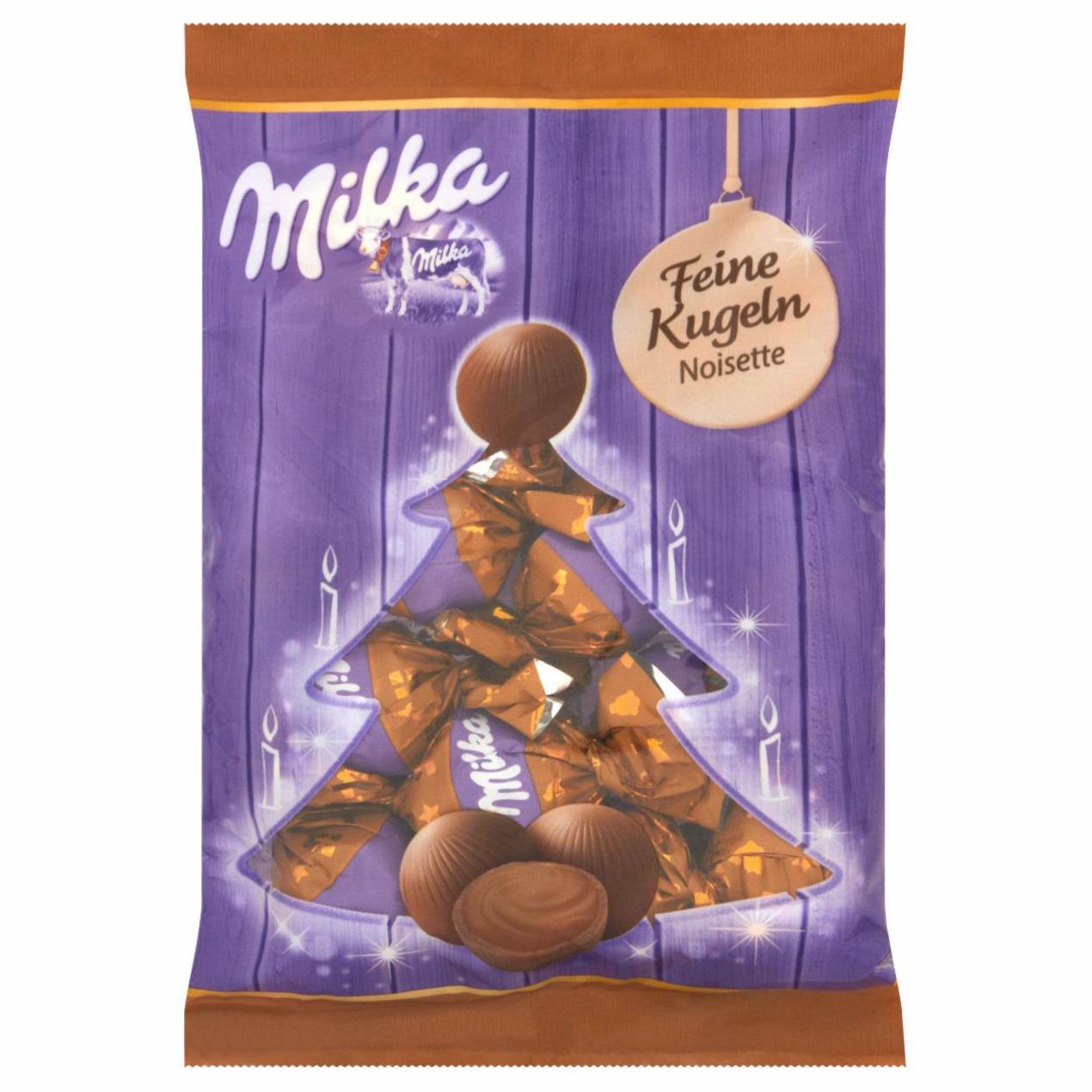 Zdjęcia - Milka Feine Kugeln Czekolada mleczna z mleka alpejskiego z mielonymi orzechami laskowymi 90 g