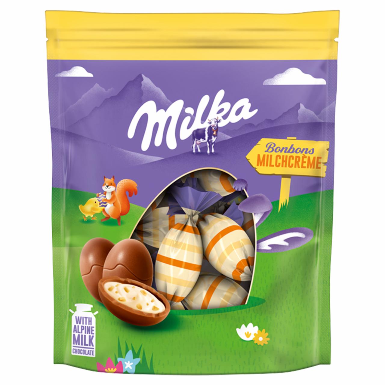Zdjęcia - Milka Czekolada mleczna z nadzieniem mlecznym i kawałkami orzechów laskowych 86 g