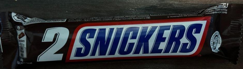 Zdjęcia - Snickers Czekolada mleczna z nugatem i nadzieniem karmelowym z orzeszkami ziemnymi 75 g (2 x 37,5 g)