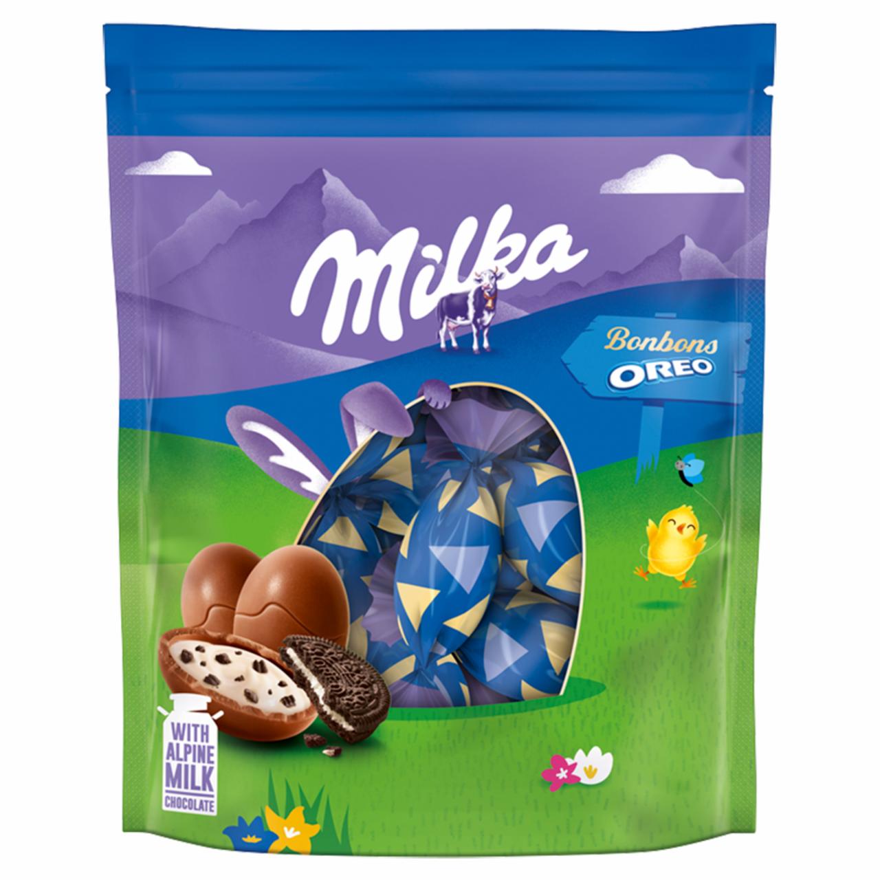 Zdjęcia - Milka Czekolada mleczna z nadzieniem mlecznym oraz pokruszone ciastka 86 g