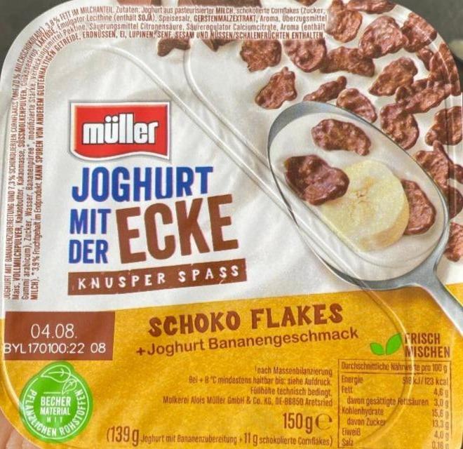 Zdjęcia - Joghurt mit der ecke schoko flakes bananen müller