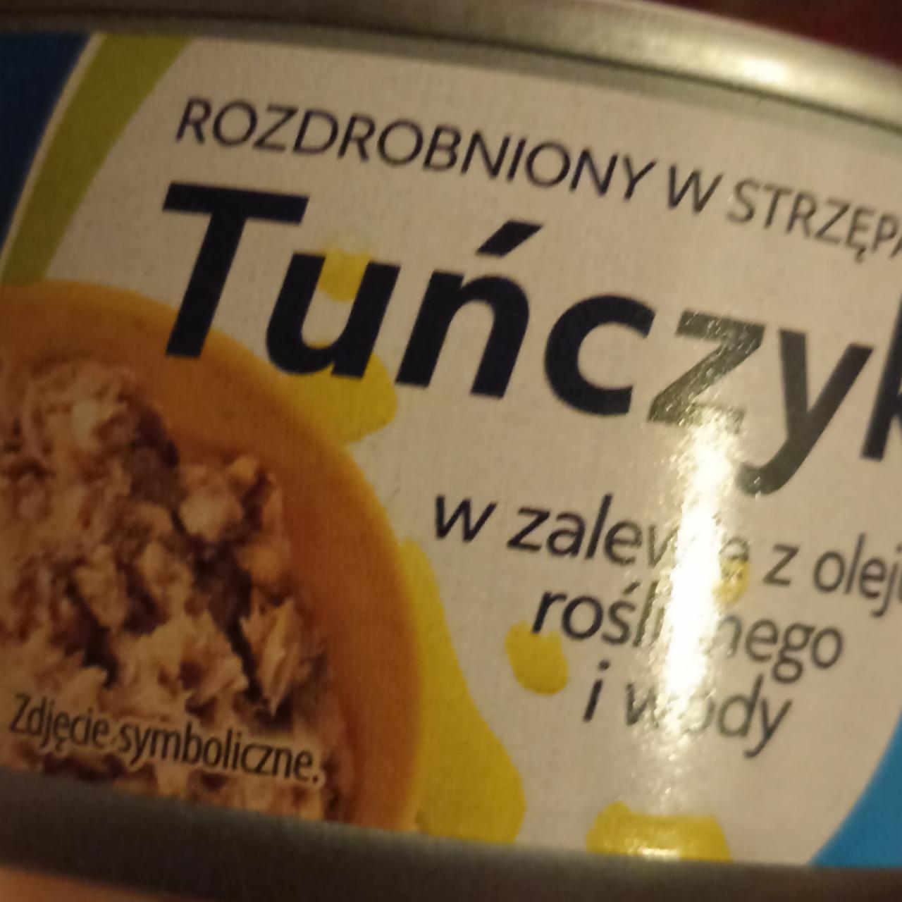 Zdjęcia - Rozdrobniony w strzępach tuńczyk w zalewie z oleju roślinnego i wody Neptun