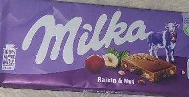 Zdjęcia - Milka Czekolada mleczna z rodzynkami i orzechami laskowymi 100 g