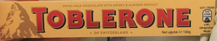 Zdjęcia - Szwajcarska czekolada mleczna z nugatem miodowo-migdałowym Toblerone